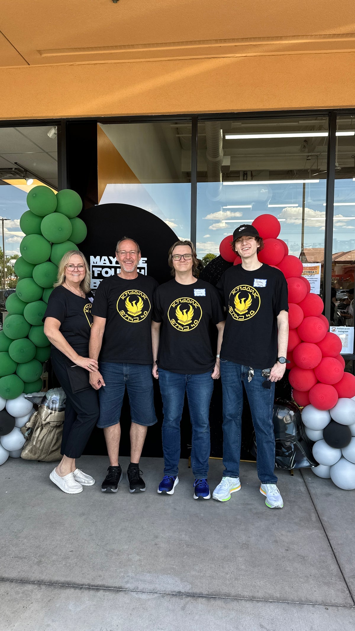 The Gregory family outside the Arizona Brick Co. storefront in Chandler, Arizona during a May the Fourth event
