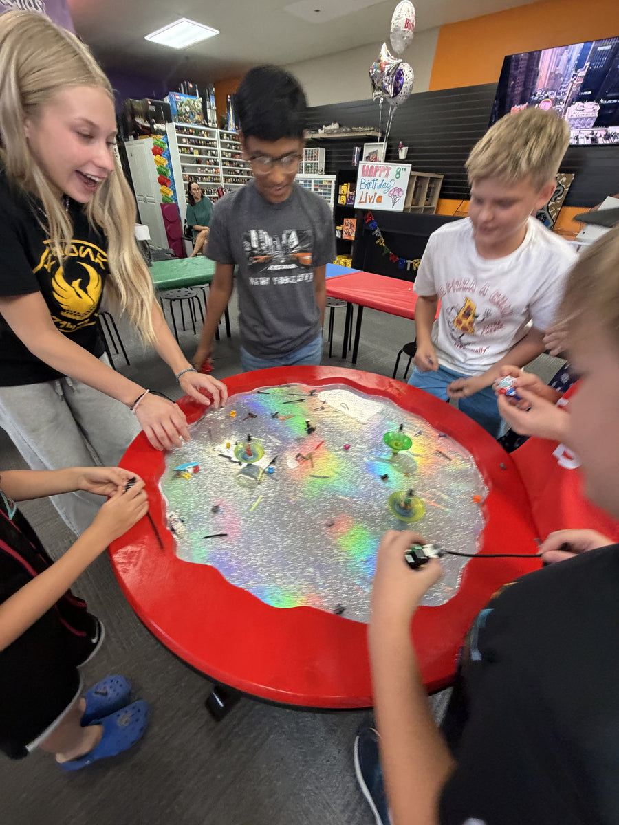 Close view of spinners in play on the battle table